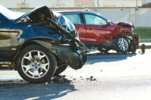 Two vehicles with severe front and rear damage after a collision, illustrating car accident cases handled by Welcome Law Firm: Bridgeport Personal Injury & Immigration Lawyer